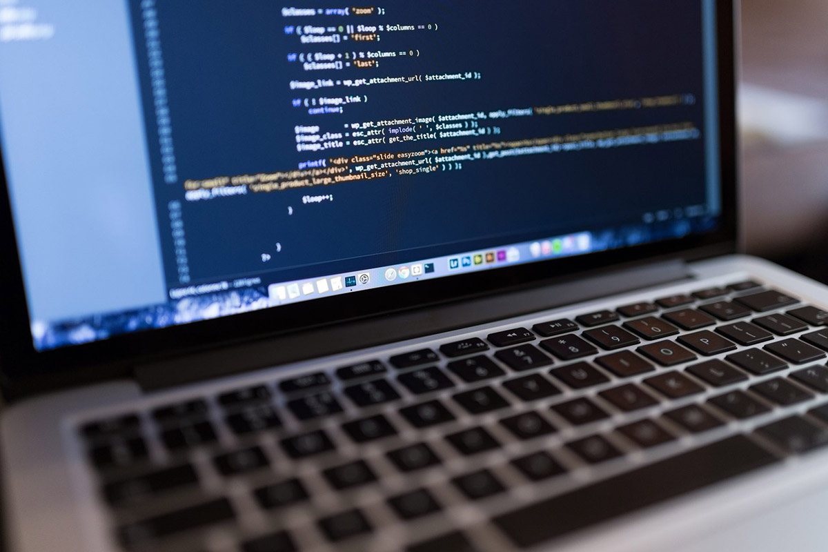 Laptop Showing Computer Code