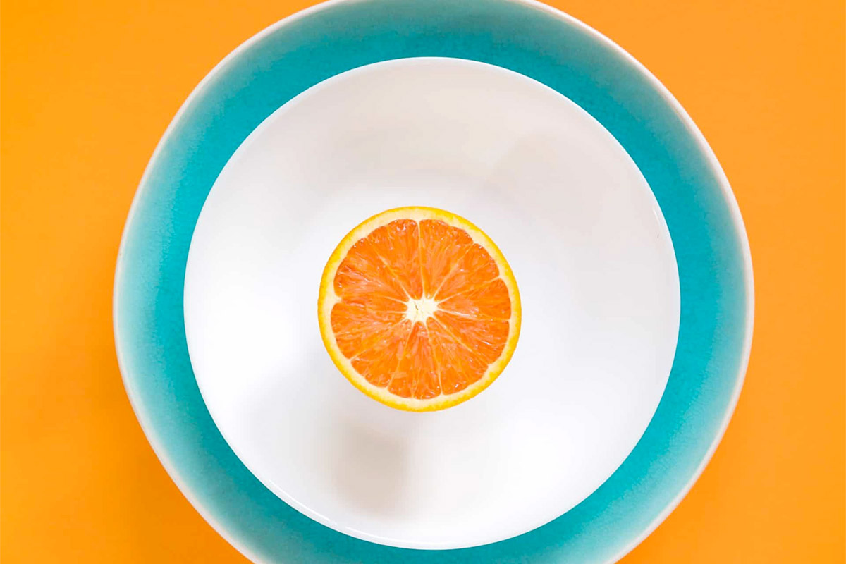 Orange Half In A Bowl