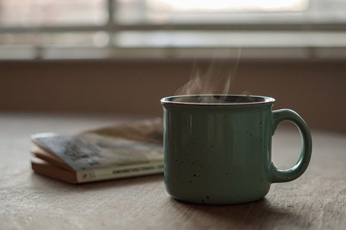 Cup Of Tea With Newspaper